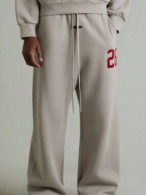 FEAR OF GOD ESSENTIALS LOUNGE FLEECE BAGGY SWEATPANTS. SZ LARGE. SMOKE GREY.